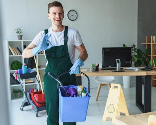 handsome-smiling-young-cleaner-holding-bucket-with-resize-pz06efcnznbwtr3nufxjt6gc4w00i9rqqvp7x9yx6w